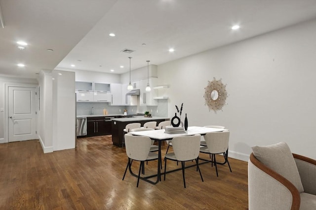 dining room featuring dark hardwood / wood-style floors