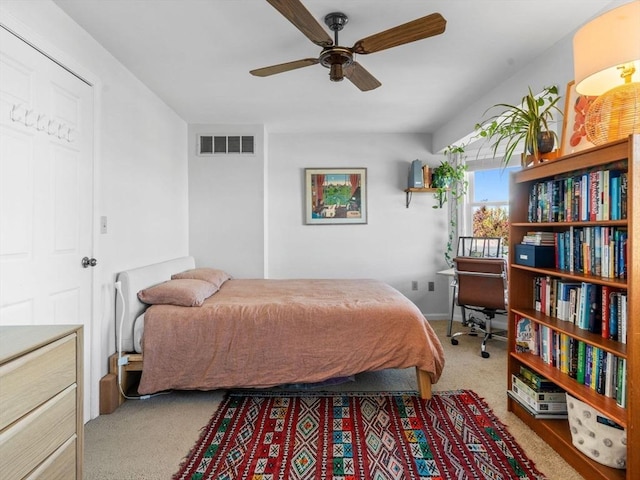bedroom featuring carpet flooring and visible vents