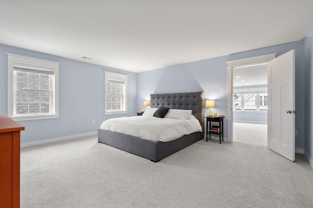 9 Baldwin Ct Unit 9, Harvard, MA 01451 - bedroom with light carpet and baseboards