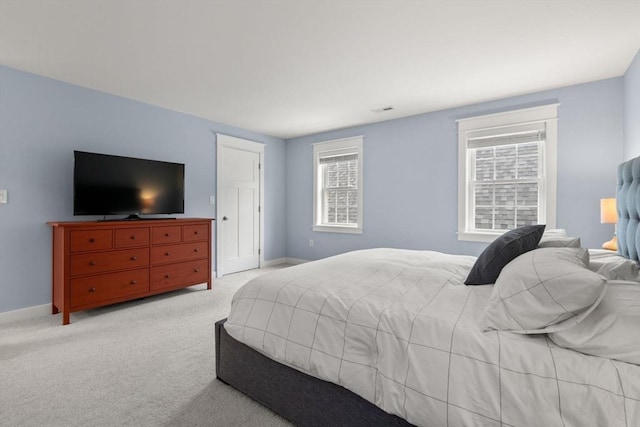 9 Baldwin Ct Unit 9, Harvard, MA 01451 - carpeted bedroom with multiple windows and baseboards