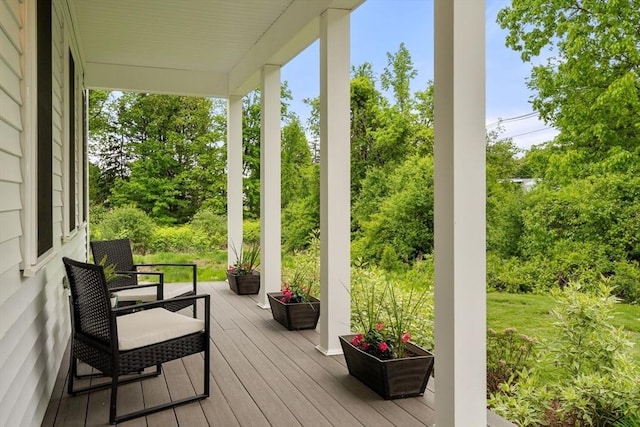 9 Baldwin Ct Unit 9, Harvard, MA 01451 - wooden porch with view of scattered trees