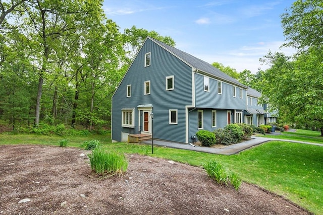16 Deer Path Unit 1, Maynard, MA 01754 - view of front facade with a front lawn