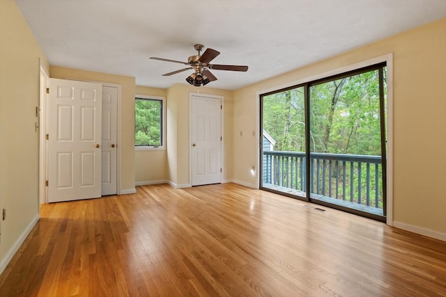 16 Deer Path Unit 1, Maynard, MA 01754 - spare room featuring baseboards, wood finished floors, and a ceiling fan