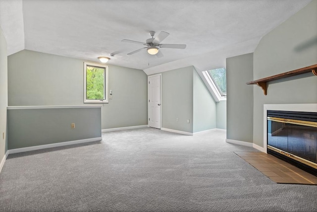 16 Deer Path Unit 1, Maynard, MA 01754 - bonus room with ceiling fan, carpet, lofted ceiling, plenty of natural light, and a skylight