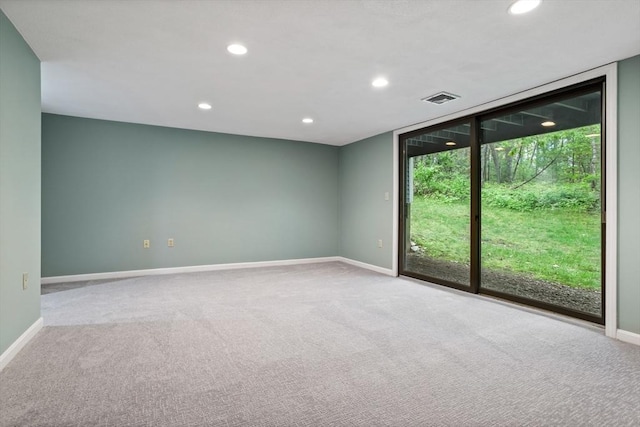 16 Deer Path Unit 1, Maynard, MA 01754 - carpeted empty room with baseboards, recessed lighting, and expansive windows