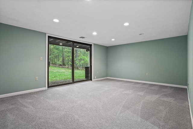 16 Deer Path Unit 1, Maynard, MA 01754 - carpeted empty room featuring recessed lighting, baseboards, and a wall of windows