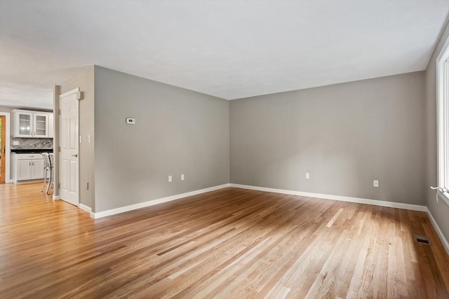16 Deer Path Unit 1, Maynard, MA 01754 - unfurnished room with light wood-style flooring and baseboards