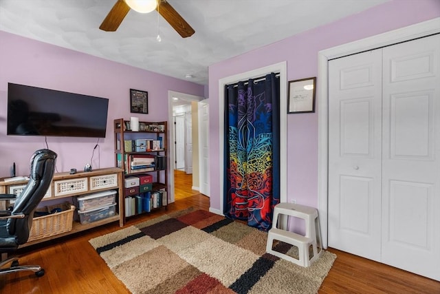 office space featuring ceiling fan and wood finished floors