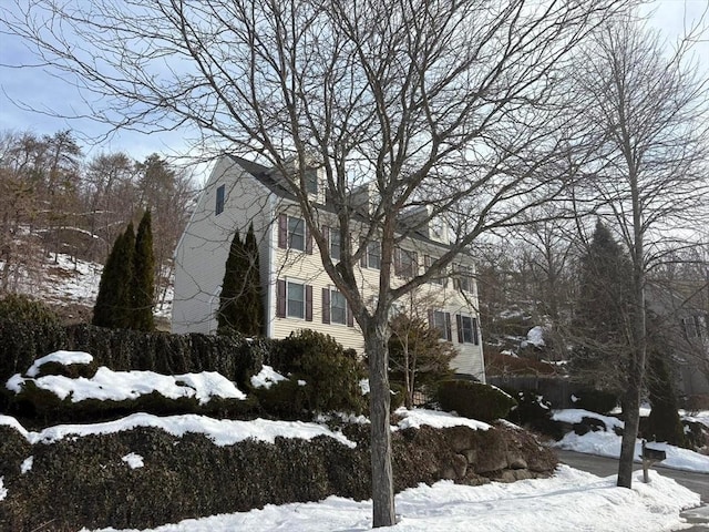 view of snow covered property