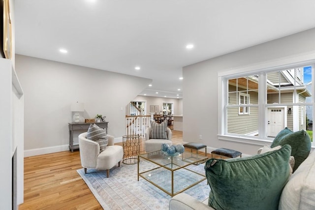 89 Wildwood St, Winchester, MA 01890 - living area with light wood-style floors and recessed lighting