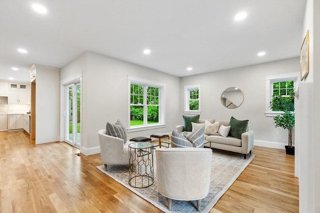 89 Wildwood St, Winchester, MA 01890 - living area featuring light wood finished floors and recessed lighting