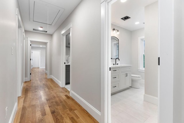 89 Wildwood St, Winchester, MA 01890 - hall featuring attic access and light wood-type flooring