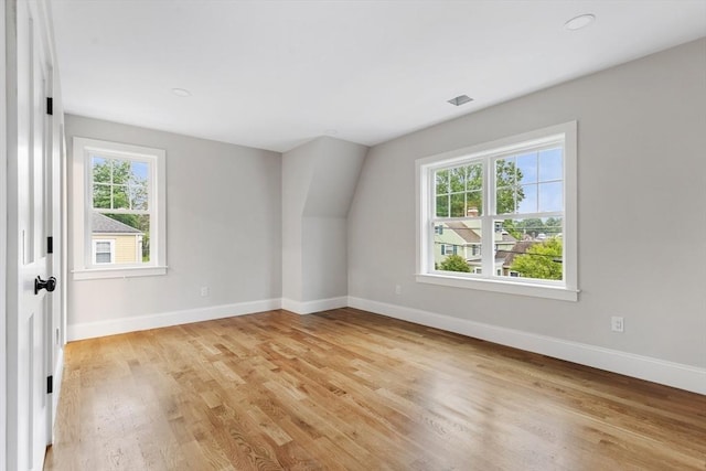 89 Wildwood St, Winchester, MA 01890 - additional living space with healthy amount of natural light and light wood-style flooring