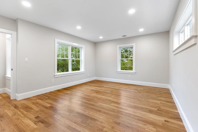 89 Wildwood St, Winchester, MA 01890 - unfurnished room featuring plenty of natural light, light wood finished floors, and recessed lighting