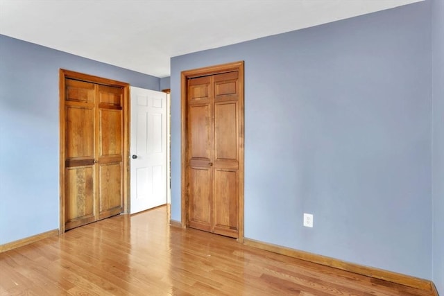 unfurnished bedroom featuring light hardwood / wood-style flooring