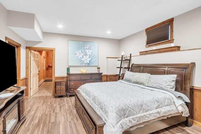 bedroom with light hardwood / wood-style flooring