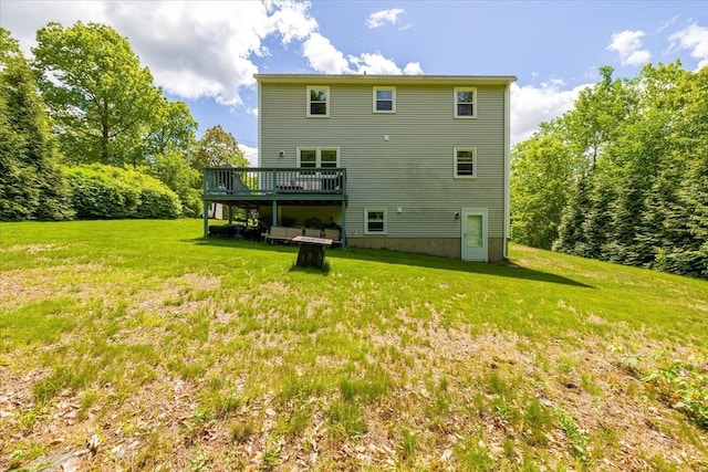 148 Prince Rd, Southbridge, MA 01550 - rear view of house featuring a lawn and a wooden deck