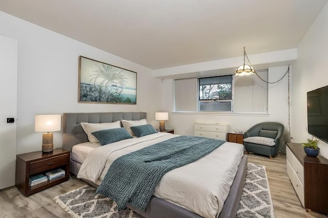 bedroom featuring light wood finished floors