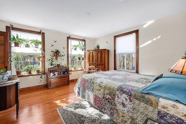 bedroom with light hardwood / wood-style floors