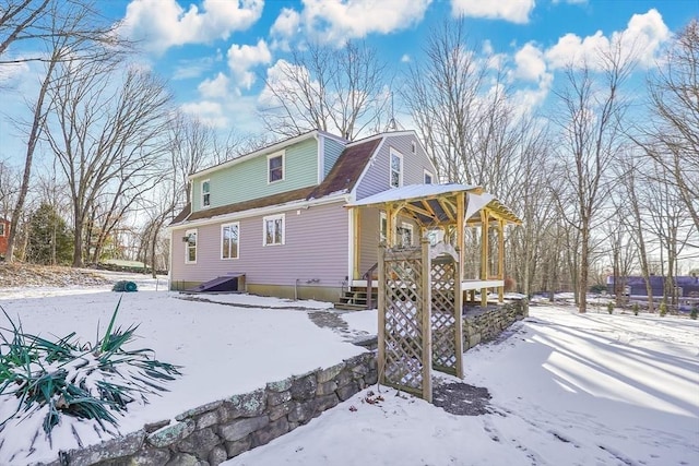 view of snow covered property