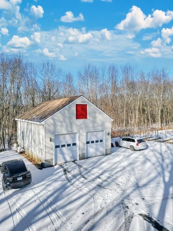 view of snow covered garage