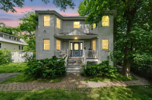 20 Tarleton Rd, Boston, MA 02132 - view of property featuring a porch and stairway