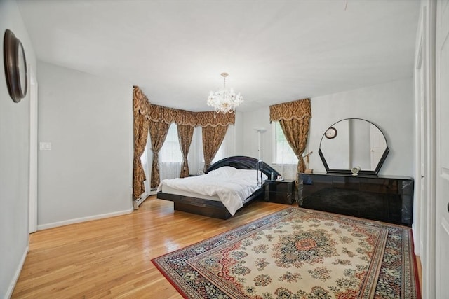 20 Tarleton Rd, Boston, MA 02132 - bedroom featuring wood finished floors, a chandelier, and baseboards