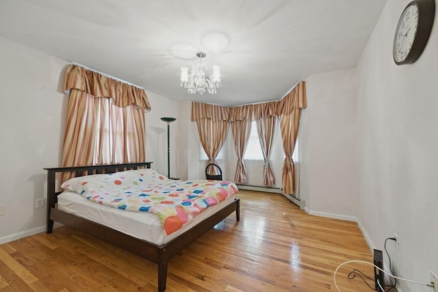 20 Tarleton Rd, Boston, MA 02132 - bedroom with a chandelier, baseboards, light wood finished floors, and a baseboard heating unit