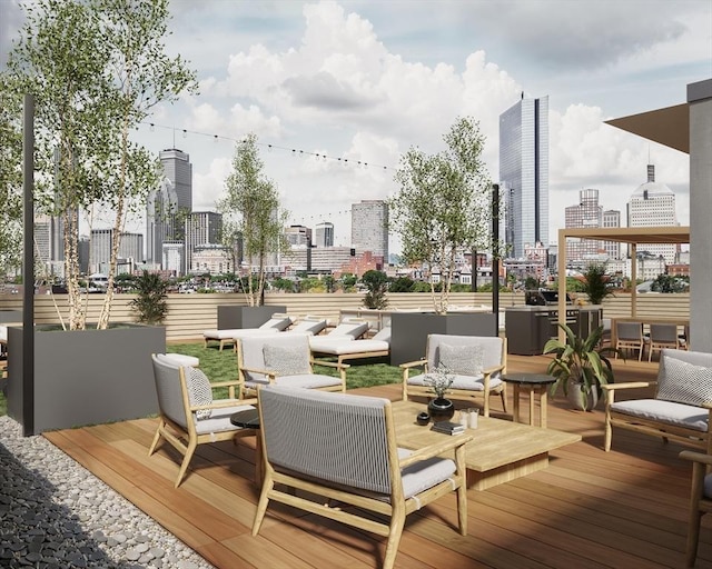 wooden deck featuring a view of skyline and an outdoor living space