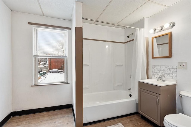 full bathroom featuring hardwood / wood-style flooring, vanity, toilet, and shower / bath combo