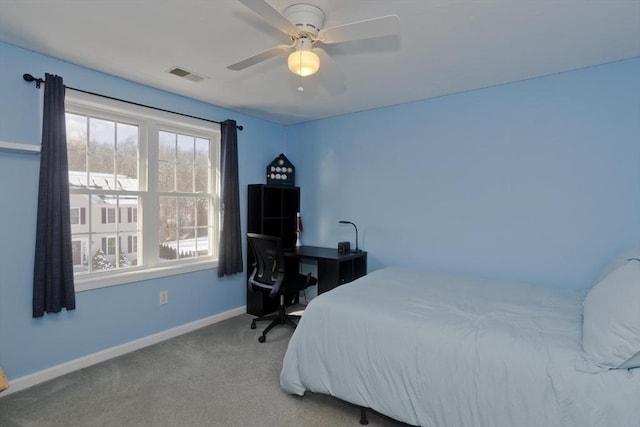 carpeted bedroom with ceiling fan