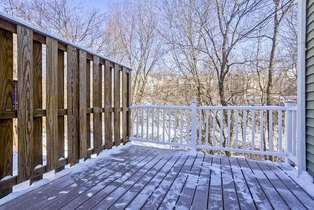 view of snow covered deck