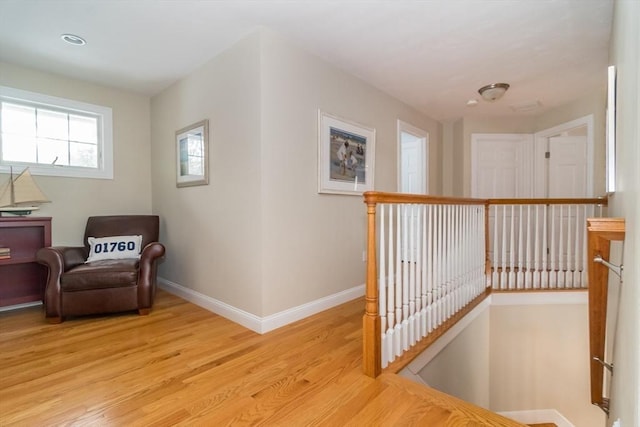 hallway featuring light hardwood / wood-style flooring