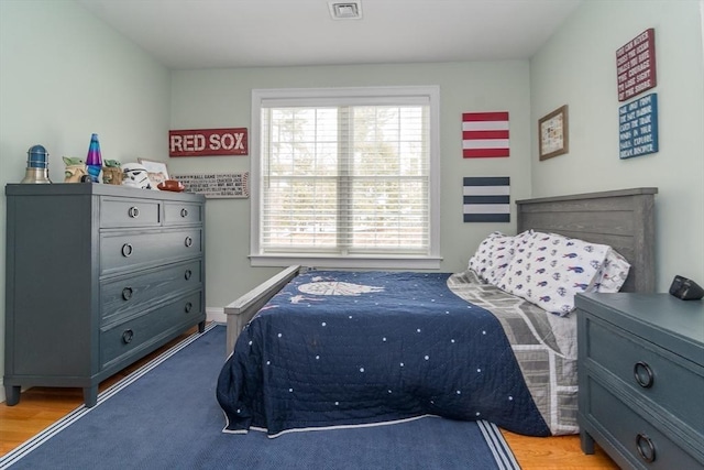 bedroom featuring light wood-type flooring