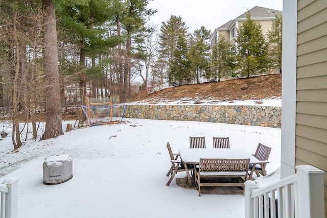 view of yard layered in snow