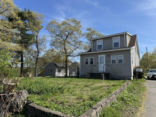 925 Washington St, Weymouth, MA 02189 - back of house with entry steps and a lawn
