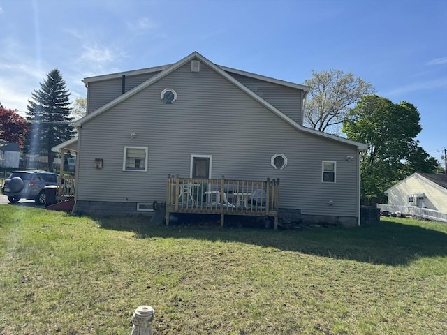 925 Washington St, Weymouth, MA 02189 - back of property with a lawn and a wooden deck