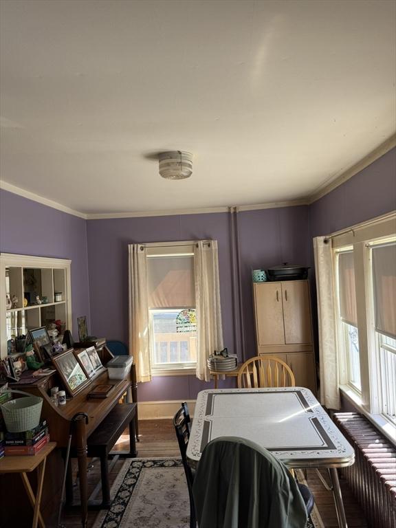 925 Washington St, Weymouth, MA 02189 - dining room featuring ornamental molding and dark wood-style flooring