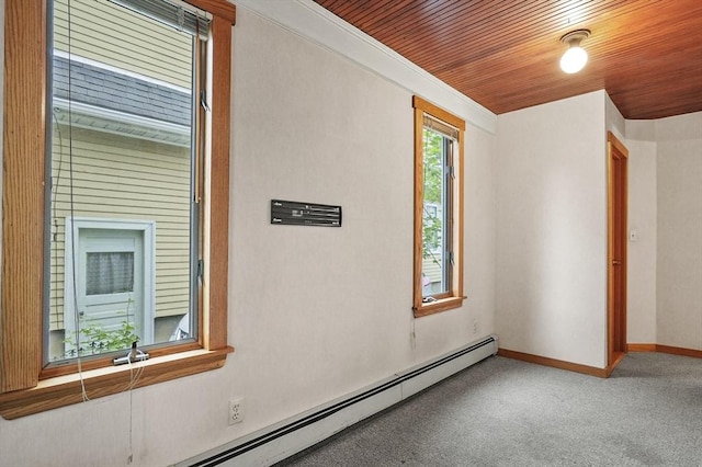 14 Lyman Ter, Waltham, MA 02452 - carpeted empty room featuring wood ceiling, baseboards, and a baseboard radiator