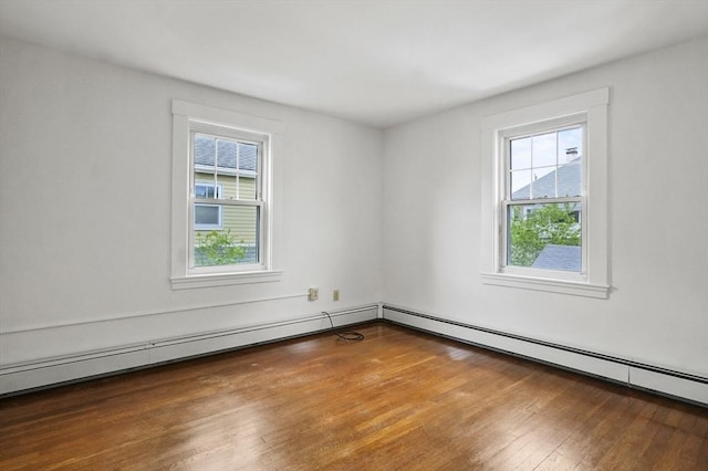 14 Lyman Ter, Waltham, MA 02452 - unfurnished room featuring plenty of natural light and hardwood / wood-style floors