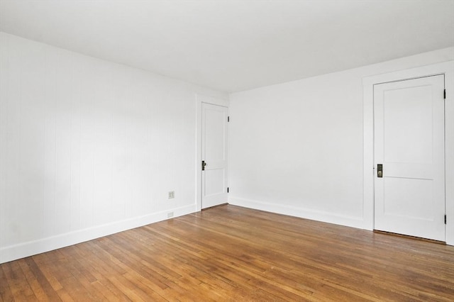 14 Lyman Ter, Waltham, MA 02452 - unfurnished room with hardwood / wood-style floors and baseboards