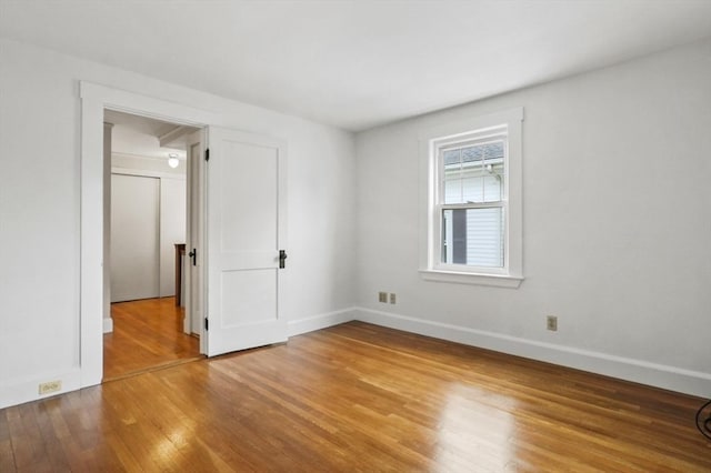14 Lyman Ter, Waltham, MA 02452 - spare room with light wood finished floors and baseboards
