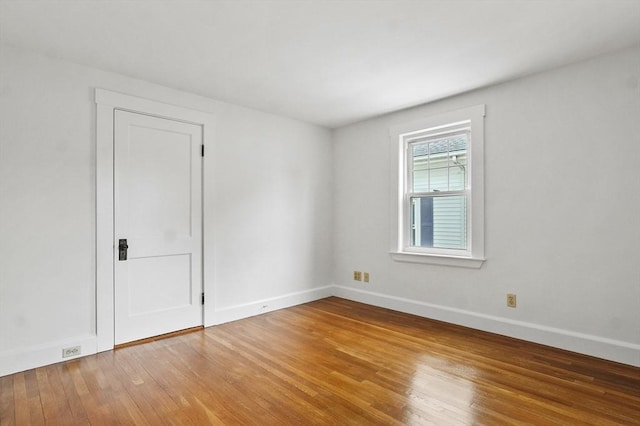 14 Lyman Ter, Waltham, MA 02452 - spare room featuring light wood-type flooring and baseboards