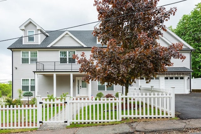 6 Fallon Cir, Braintree, MA 02184 - traditional-style house with driveway, roof with shingles, a balcony, and a gate