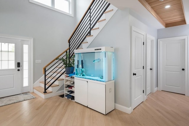 6 Fallon Cir, Braintree, MA 02184 - entryway with light wood-style flooring, stairs, plenty of natural light, recessed lighting, and wood ceiling