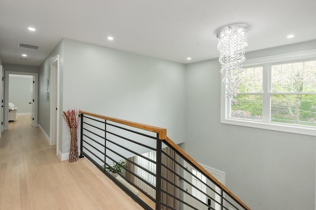 6 Fallon Cir, Braintree, MA 02184 - hallway featuring an upstairs landing, light wood-style flooring, recessed lighting, a chandelier, and baseboards