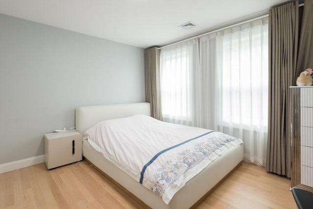 6 Fallon Cir, Braintree, MA 02184 - bedroom with baseboards and light wood-style flooring
