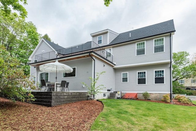 6 Fallon Cir, Braintree, MA 02184 - back of property featuring a lawn, central air condition unit, and a patio area