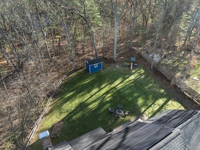 drone / aerial view featuring a forest view