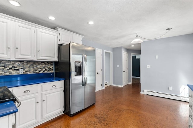 kitchen featuring a baseboard radiator, stainless steel fridge with ice dispenser, decorative backsplash, white cabinetry, and baseboards